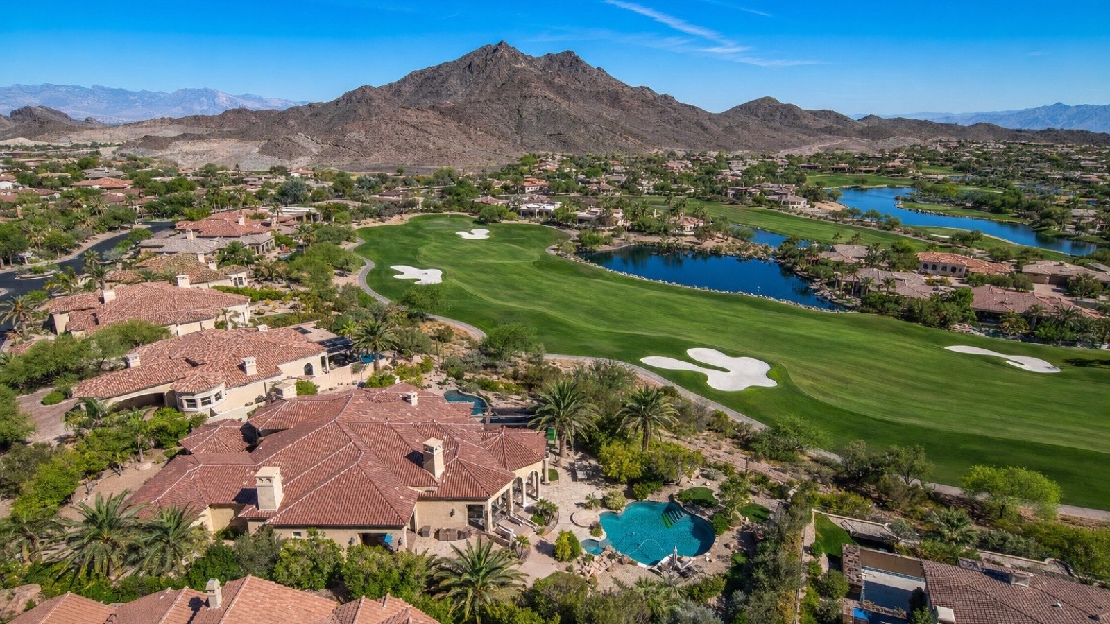 Henderson Nevada master-planned community golf course and residential streets showing HOA-maintained landscaping and shared amenities